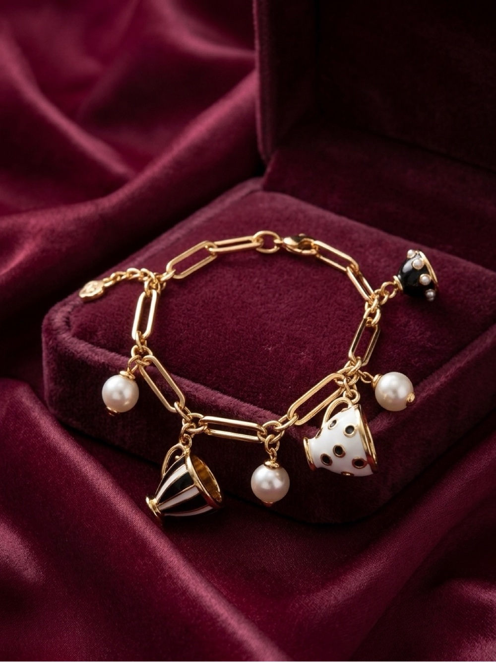 Kate Spade Gold-Tone Pearl Charm Bracelet in Black and White